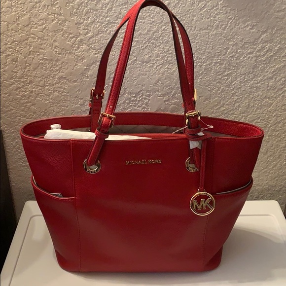voyager east west crossgrain leather tote